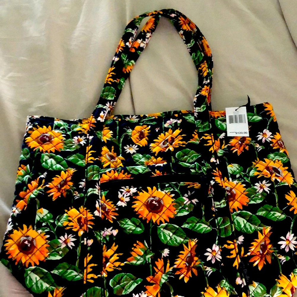 Vera Bradley sunflower bag. New w/tag. Medium large size zipper front pocket.